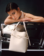 Chic Ivory Togo Leather Belted Tote Bag - Stylish Adjustable Shoulder Handbag