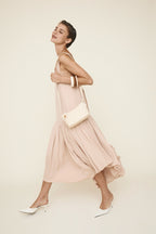 Chic Ivory Togo Leather Twister Hobo Bag with Adjustable Strap Gold Accents