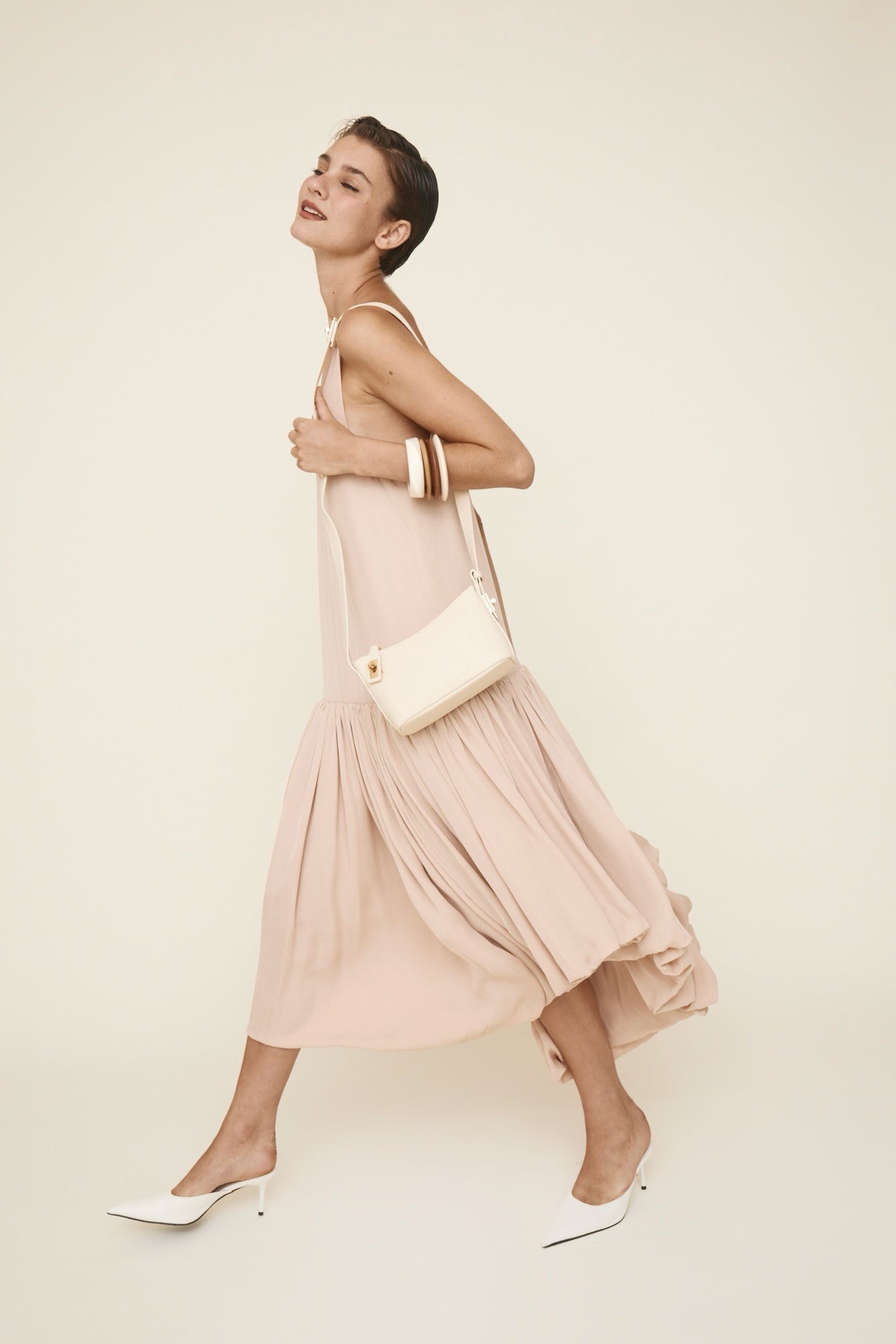 Chic Ivory Togo Leather Twister Hobo Bag with Adjustable Strap Gold Accents