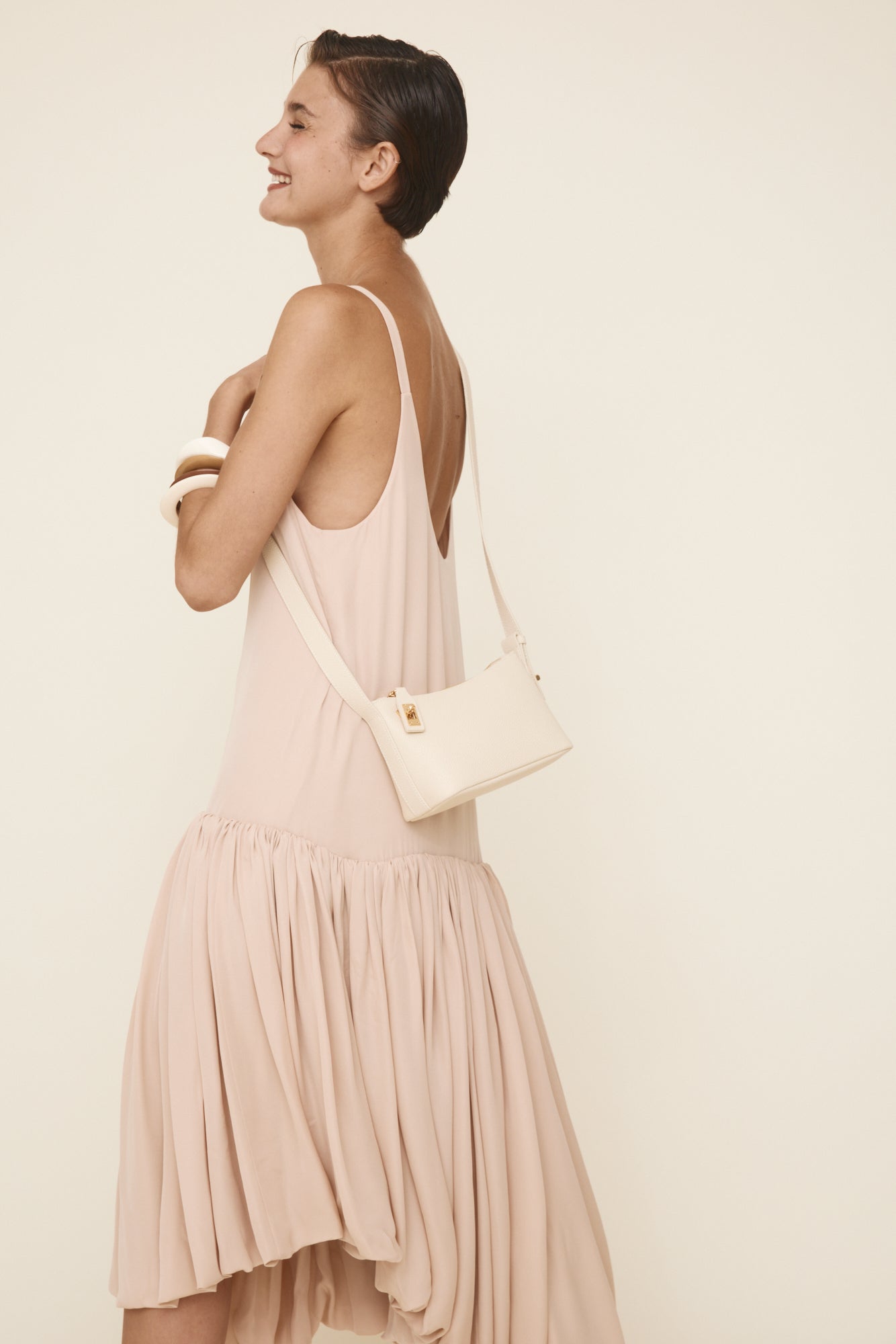 Chic Ivory Togo Leather Twister Hobo Bag with Adjustable Strap Gold Accents