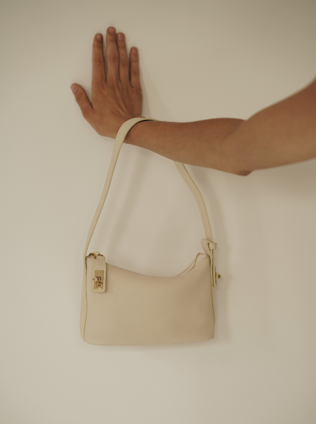 Chic Ivory Togo Leather Twister Hobo Bag with Adjustable Strap Gold Accents