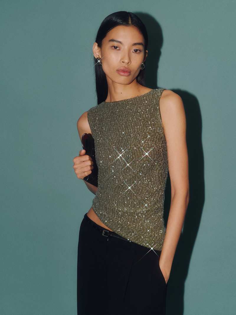 https://media.thereformation.com/image/upload/f_auto,q_auto,dpr_1.0/w_800,c_scale//PRD-SFCC/1316119/OLIVE_SHEER_SEQUIN/1316119.1.OLIVE_SHEER_SEQUIN?_s=RAABAB0