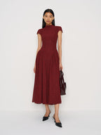 Elegant Maven Cap Sleeve Maxi Dress: Mock Neck, Drop Waist, Pleated Skirt