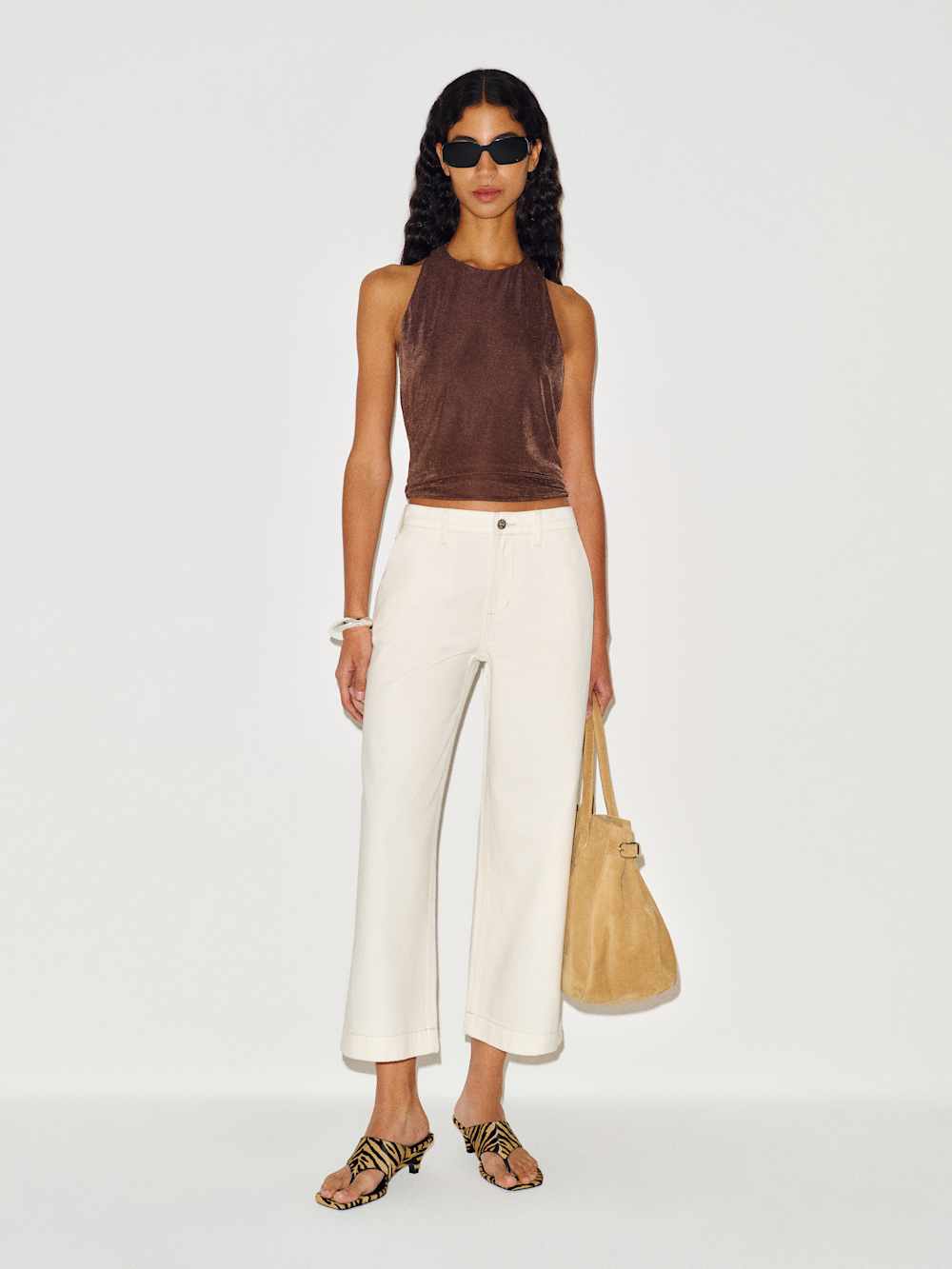 https://media.thereformation.com/image/upload/f_auto,q_auto:eco,dpr_2.0/w_500/PRD-SFCC/1319653/FIOR_DI_LATTE_TROUSER_POCKET/1319653.1.FIOR_DI_LATTE_TROUSER_POCKET