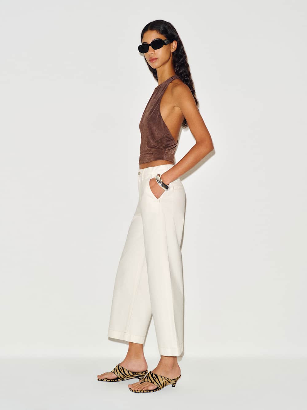 https://media.thereformation.com/image/upload/f_auto,q_auto:eco,dpr_2.0/w_500/PRD-SFCC/1319653/FIOR_DI_LATTE_TROUSER_POCKET/1319653.5.FIOR_DI_LATTE_TROUSER_POCKET