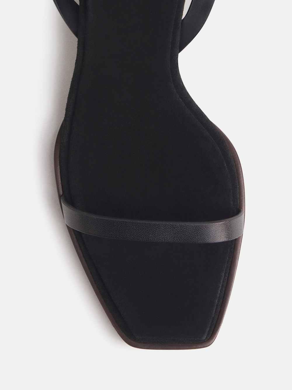 https://media.thereformation.com/image/upload/f_auto,q_auto:eco,dpr_2.0/w_500/PRD-SFCC/1319690/BLACK_LEATHER/1319690.2.BLACK_LEATHER