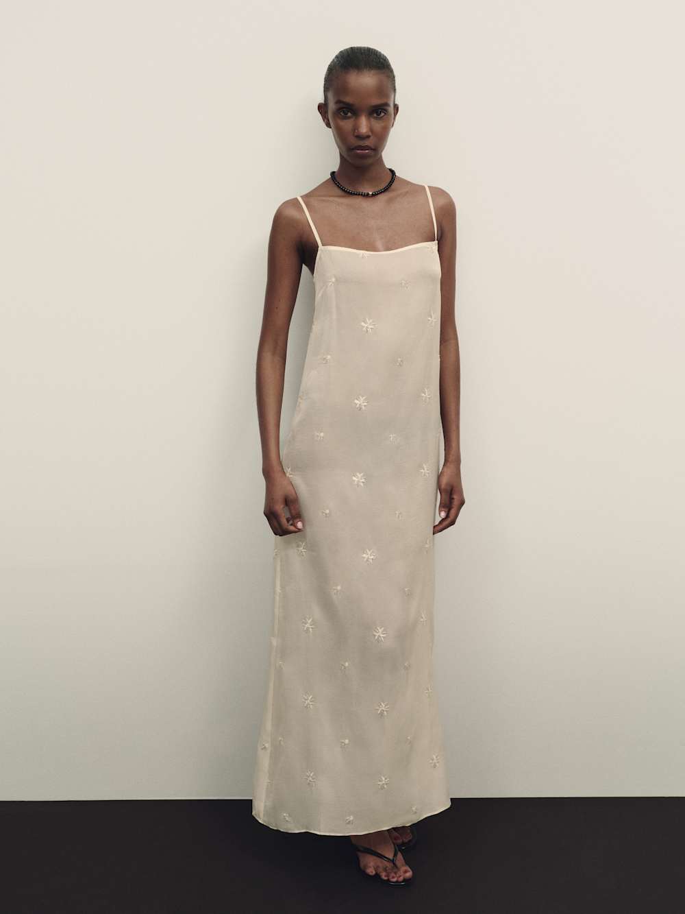 https://media.thereformation.com/image/upload/f_auto,q_auto:eco,dpr_2.0/w_500/PRD-SFCC/1319870/IVORY_EMBELLISHED/1319870.2.IVORY_EMBELLISHED