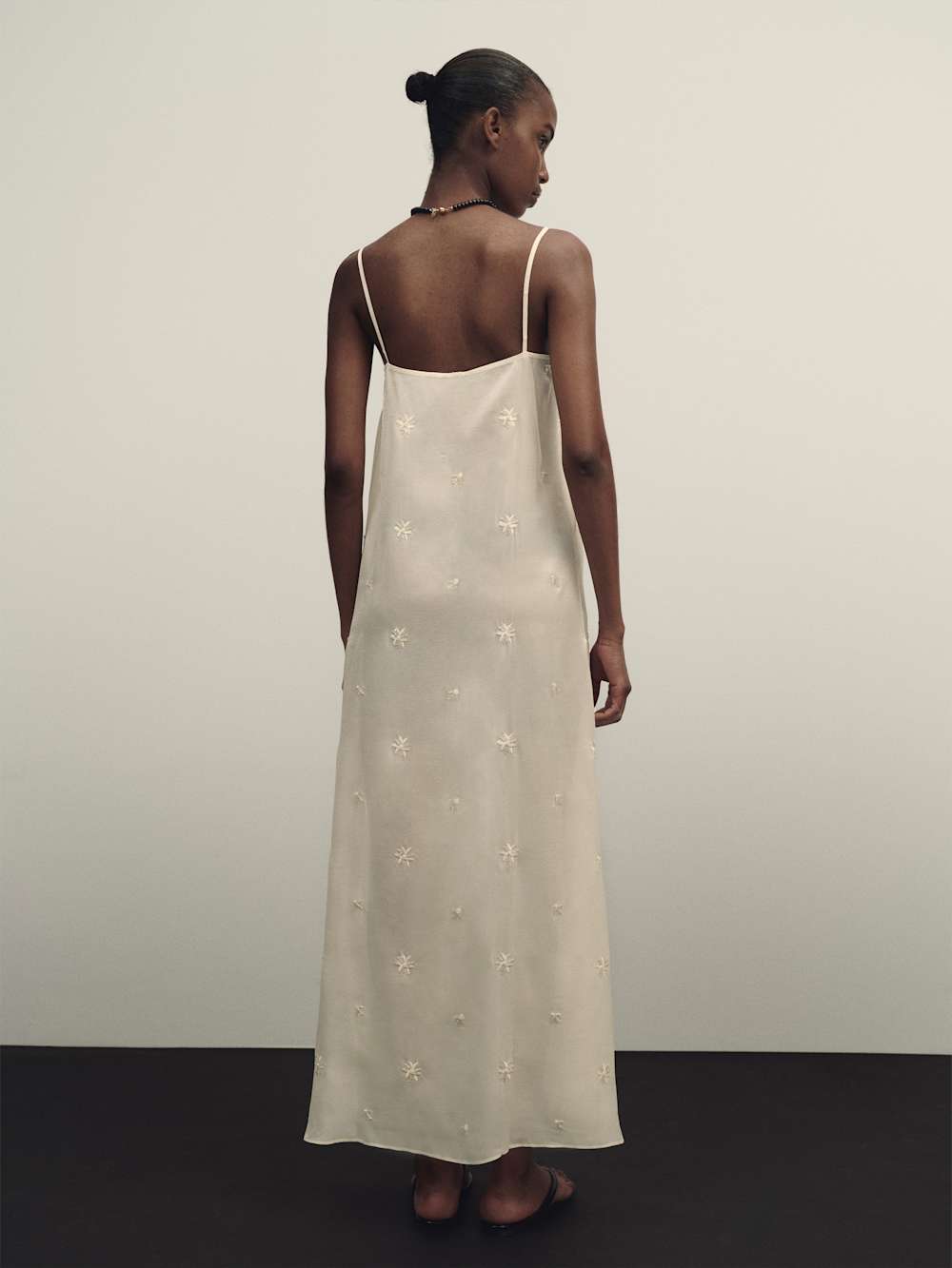 https://media.thereformation.com/image/upload/f_auto,q_auto:eco,dpr_2.0/w_500/PRD-SFCC/1319870/IVORY_EMBELLISHED/1319870.3.IVORY_EMBELLISHED
