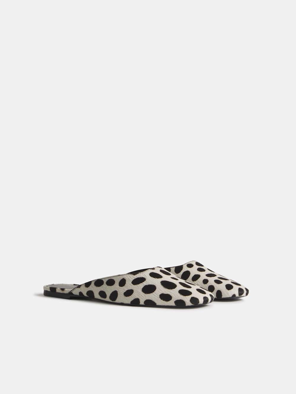 https://media.thereformation.com/image/upload/f_auto,q_auto:eco,dpr_2.0/w_500/PRD-SFCC/1320340/DALMATIAN_HAIRCALF/1320340.3.DALMATIAN_HAIRCALF