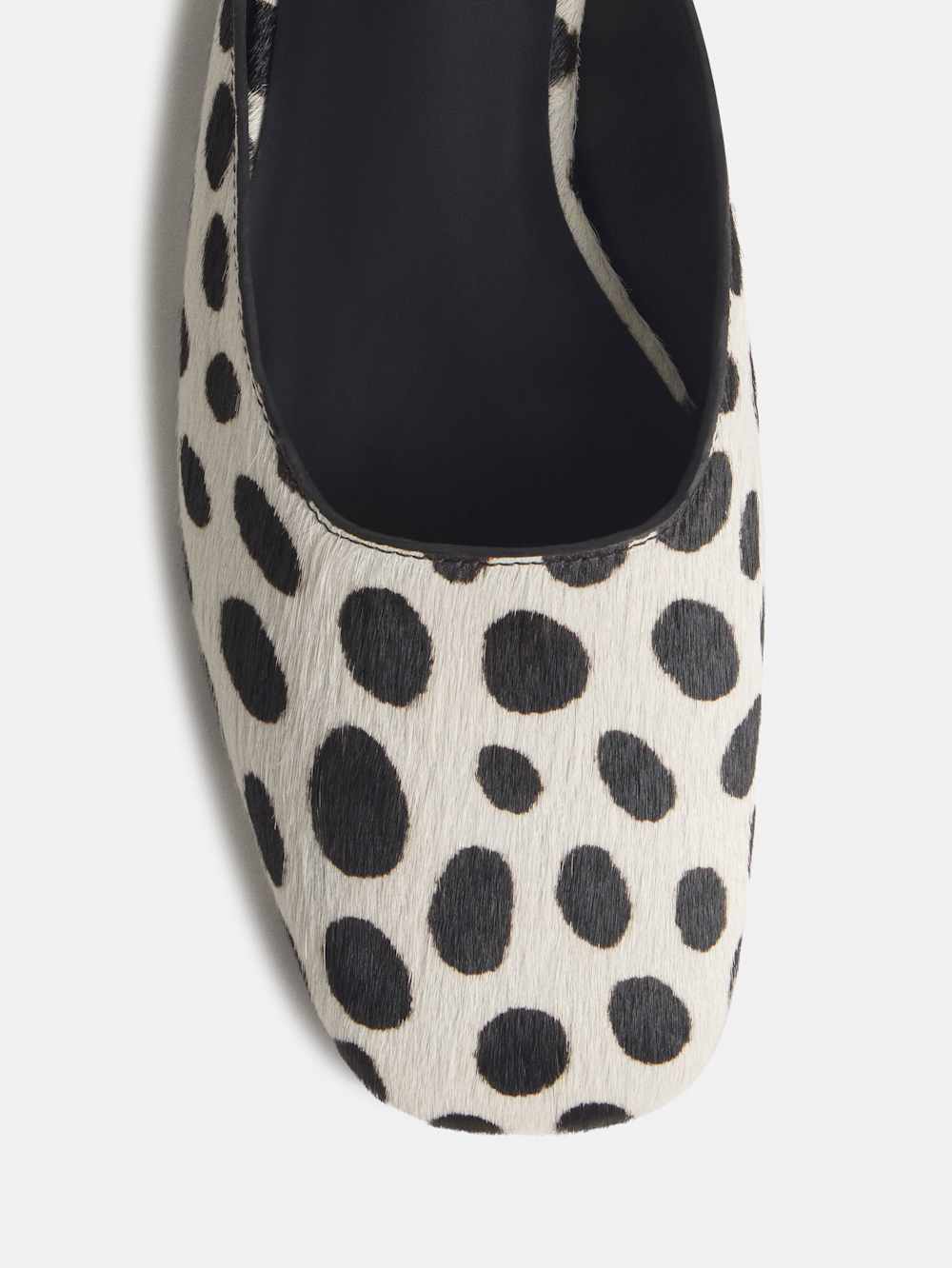 https://media.thereformation.com/image/upload/f_auto,q_auto:eco,dpr_2.0/w_500/PRD-SFCC/1320340/DALMATIAN_HAIRCALF/1320340.4.DALMATIAN_HAIRCALF