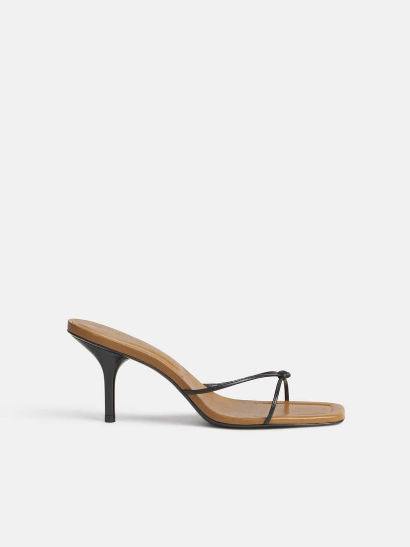 https://media.thereformation.com/image/upload/f_auto,q_auto:eco,dpr_2.0/w_500/PRD-SFCC/1320342/BLACK_LEATHER/1320342.1.BLACK_LEATHER