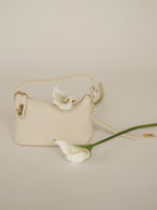Chic Ivory Togo Leather Twister Hobo Bag with Adjustable Strap Gold Accents