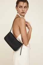 Chic Genuine Leather Black Shoulder Bag with Golden Hardware - Compact Baguette Style
