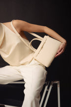 Chic Ivory Togo Leather Book Tote Bag 25: Versatile Crossbody Handbag