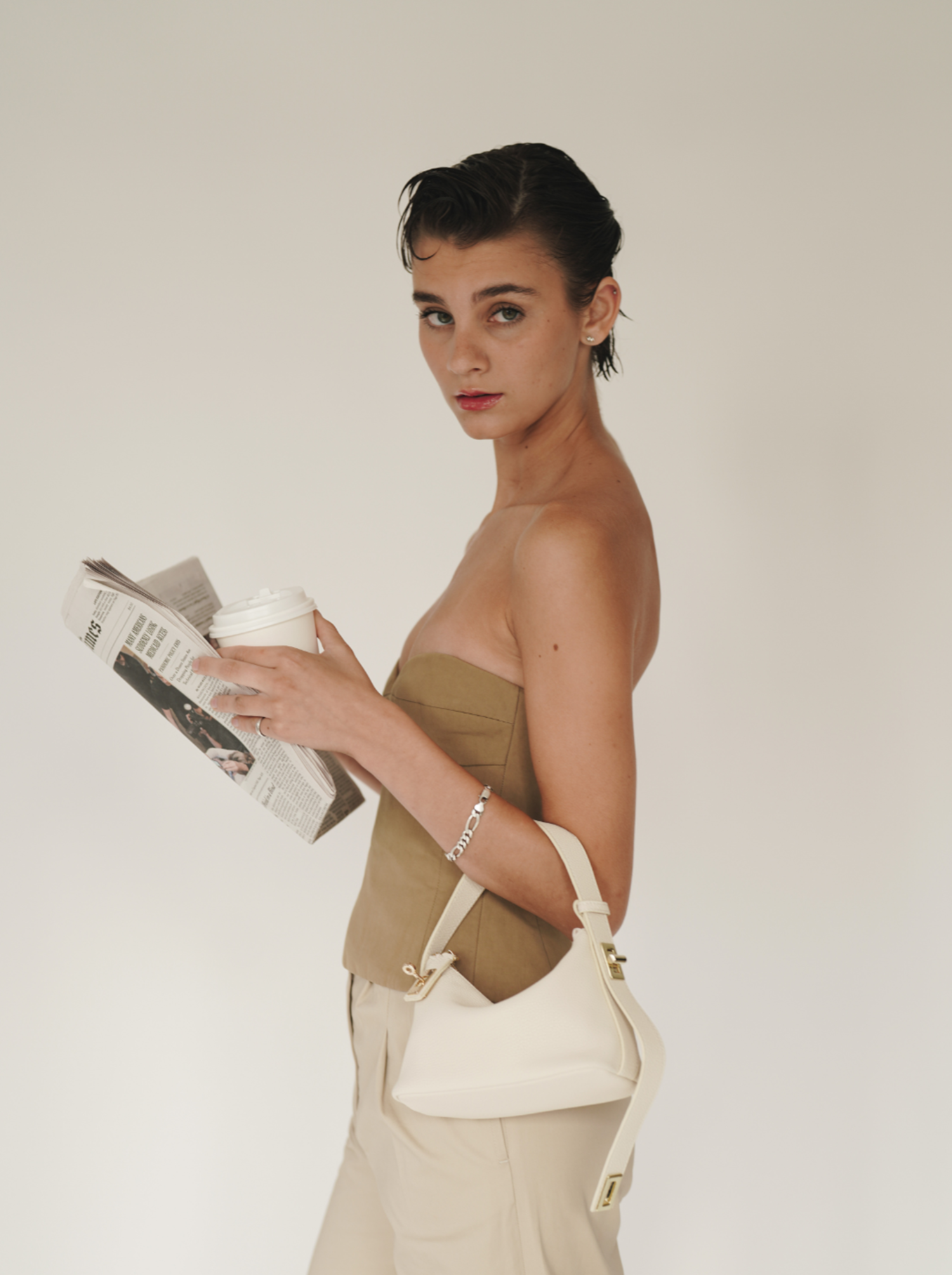 Chic Ivory Togo Leather Twister Hobo Bag with Adjustable Strap Gold Accents