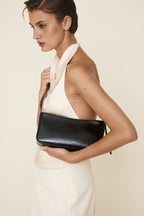 Chic Genuine Leather Black Shoulder Bag with Golden Hardware - Compact Baguette Style