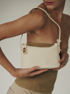 Chic Ivory Togo Leather Twister Hobo Bag with Adjustable Strap Gold Accents