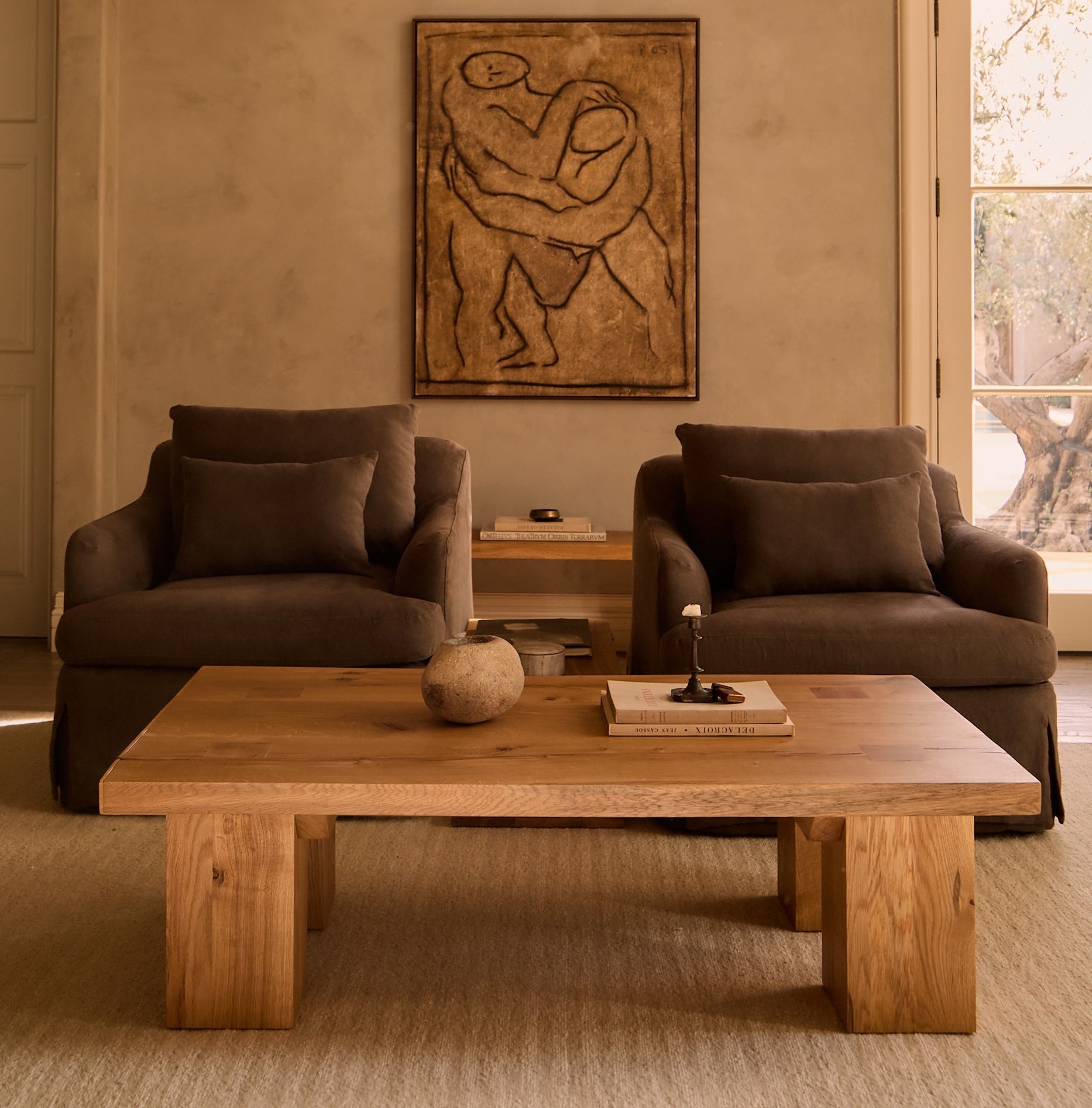 https://cdn.shopify.com/s/files/1/0593/2217/1565/files/Antwerp-Arm-Chair-Cocoa-Antwerp-Rectangle-Coffee-Table_c631dc1b-739e-4b25-b9cb-8215843dc9cc.jpg?v=1772586806