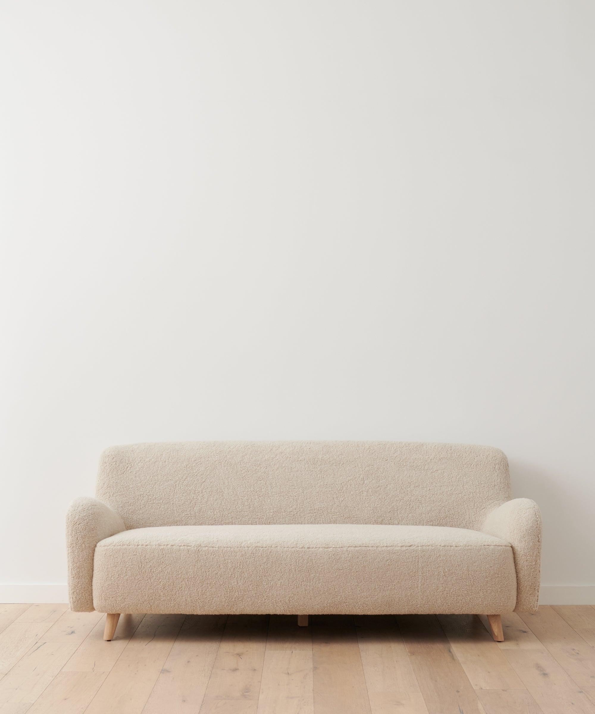 https://cdn.shopify.com/s/files/1/0565/1234/8333/products/Aspen_Boucle_Sofa_Bone_1.jpg?v=1762182844