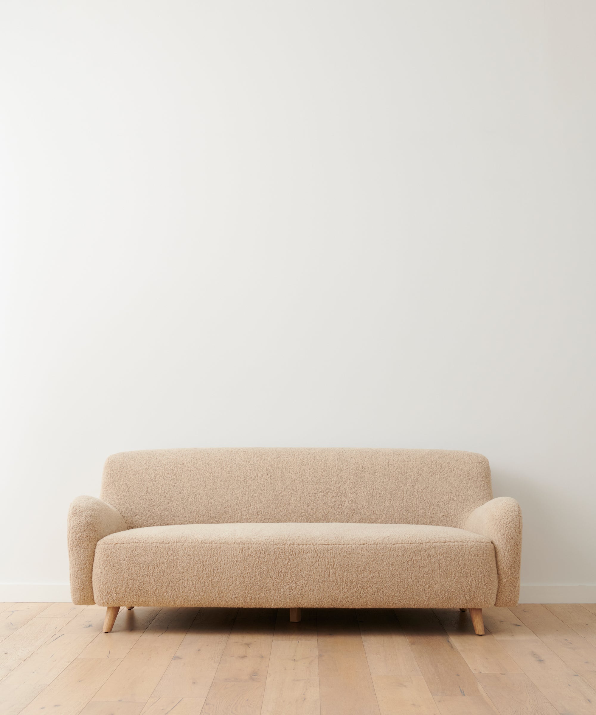 https://cdn.shopify.com/s/files/1/0565/1234/8333/products/Aspen_Boucle_Sofa_Oatmeal_1.jpg?v=1762182837