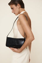 Chic Genuine Leather Black Shoulder Bag with Golden Hardware - Compact Baguette Style