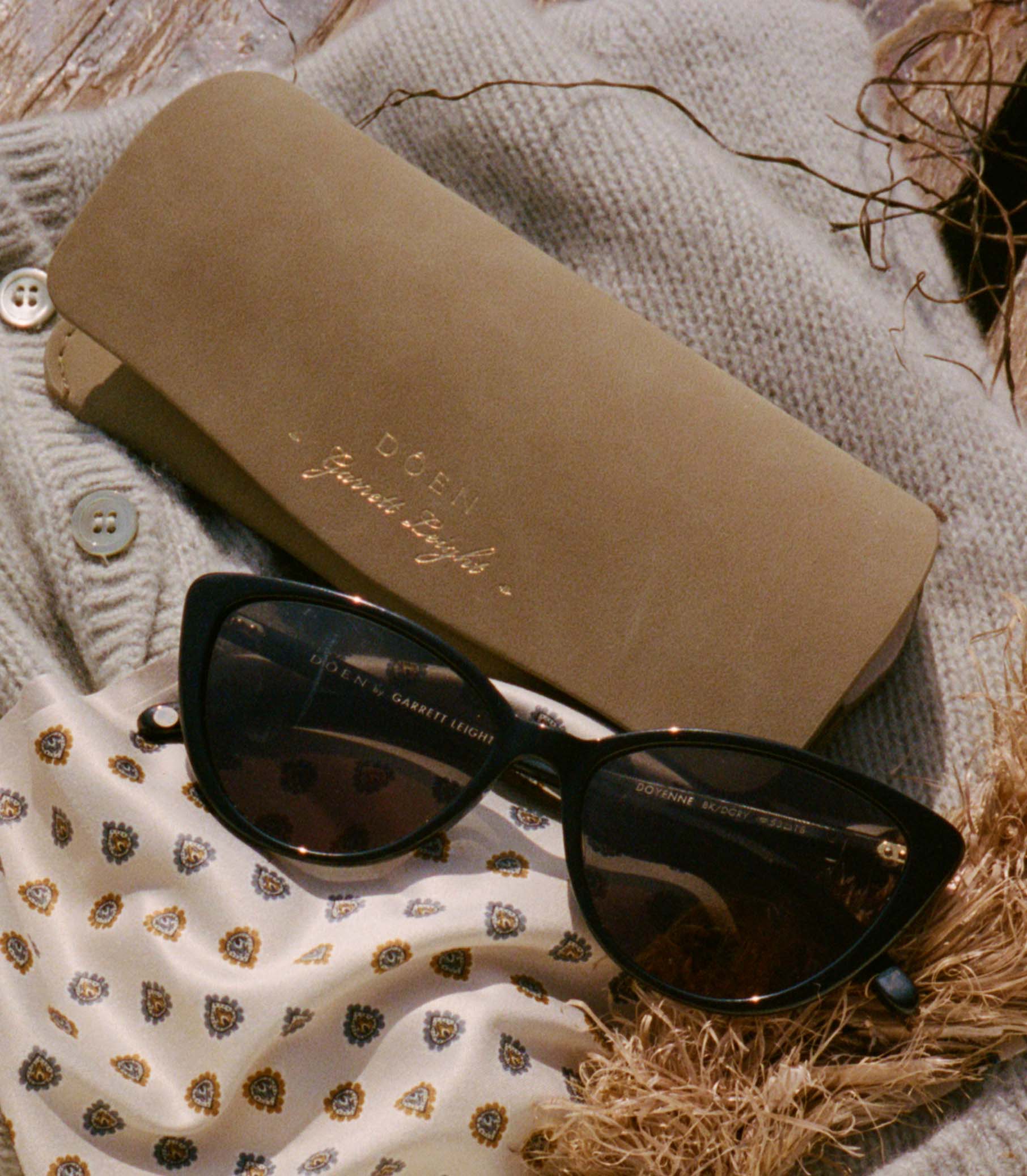 https://cdn.shopify.com/s/files/1/0950/9820/files/DOYENNE-SUNGLASSES_BLACK_11.jpg?v=1774287263