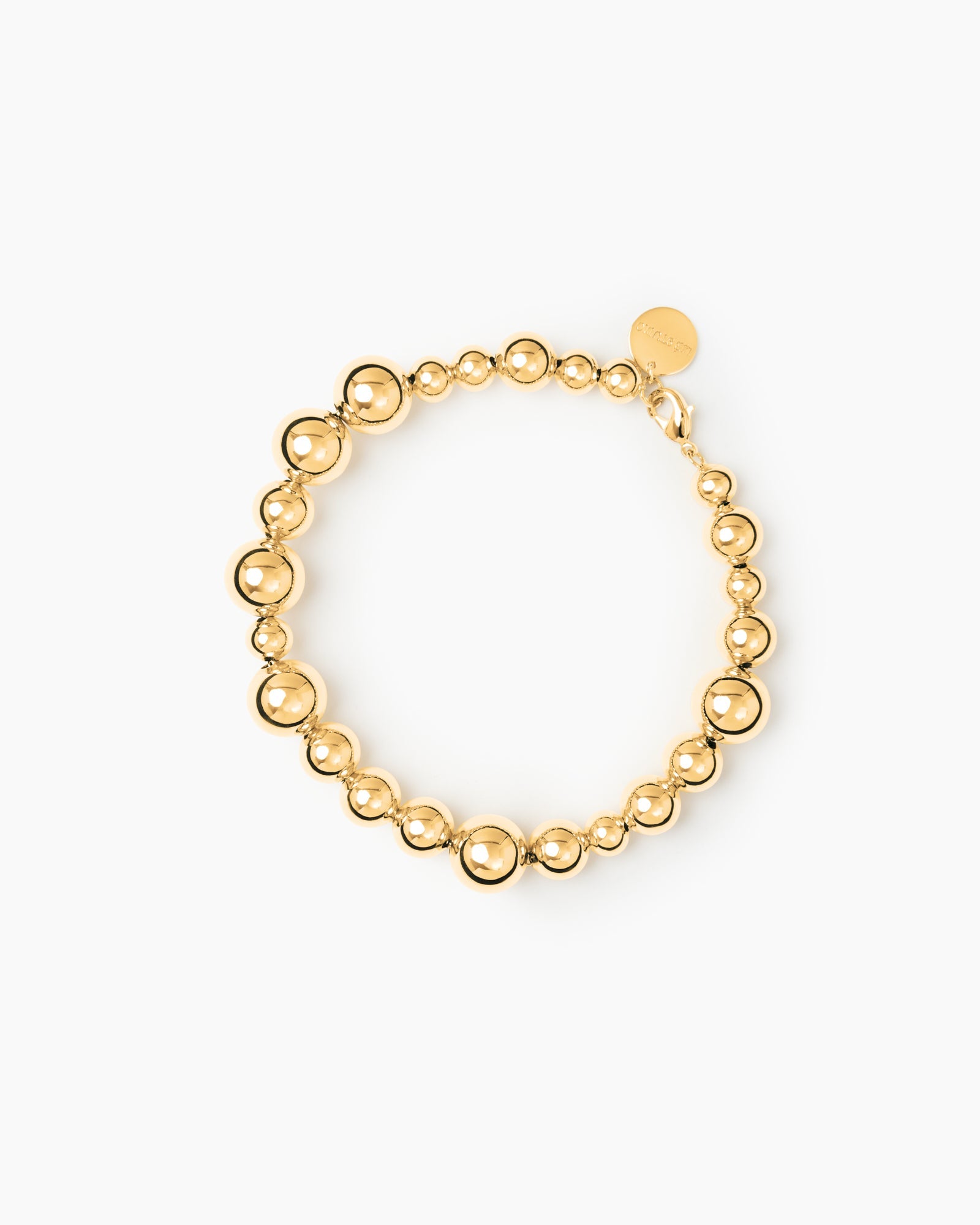 https://cdn.shopify.com/s/files/1/0592/5945/3598/files/Elly_brac_gold.jpg?v=1748260839