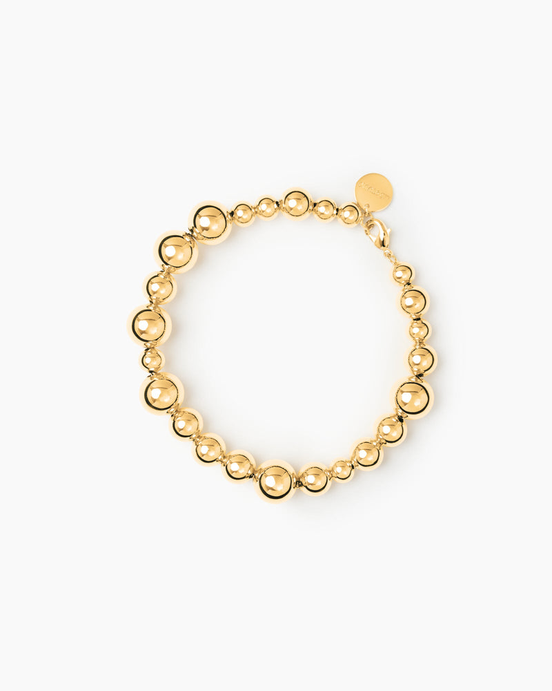 https://cdn.shopify.com/s/files/1/0592/5945/3598/files/Elly_brac_gold.jpg?v=1748260839