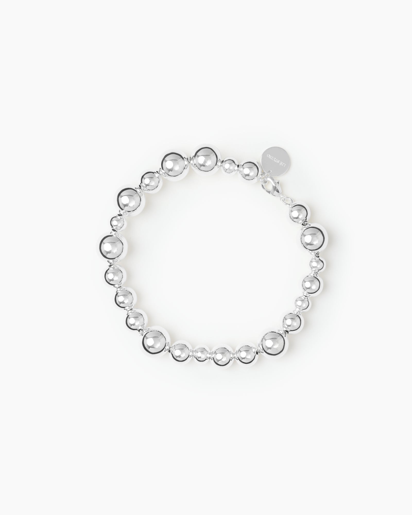 https://cdn.shopify.com/s/files/1/0592/5945/3598/files/Elly_brac_silver.jpg?v=1748260743