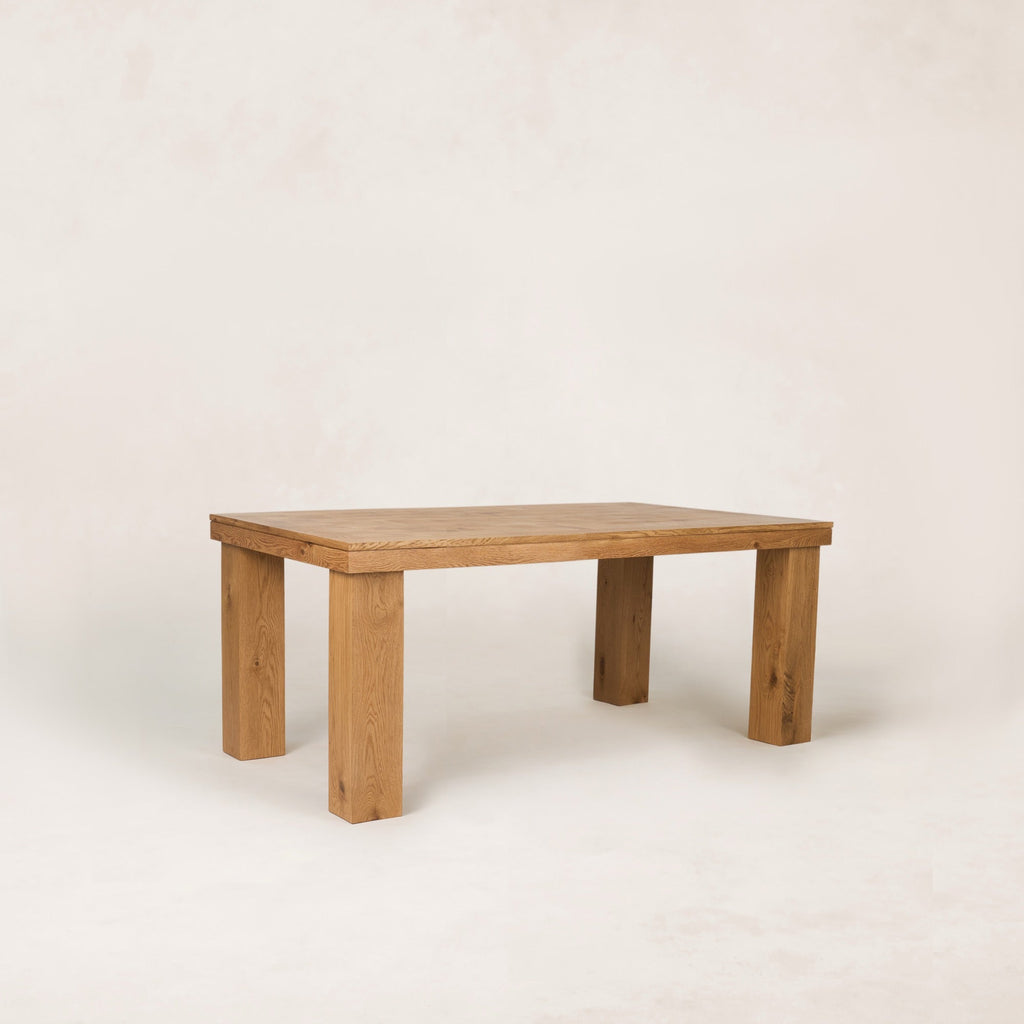 https://cdn.shopify.com/s/files/1/0593/2217/1565/files/Ghent_DiningTable_72_3_4_Parquet_SolidOak_FrenchOak.jpg?v=1772823104