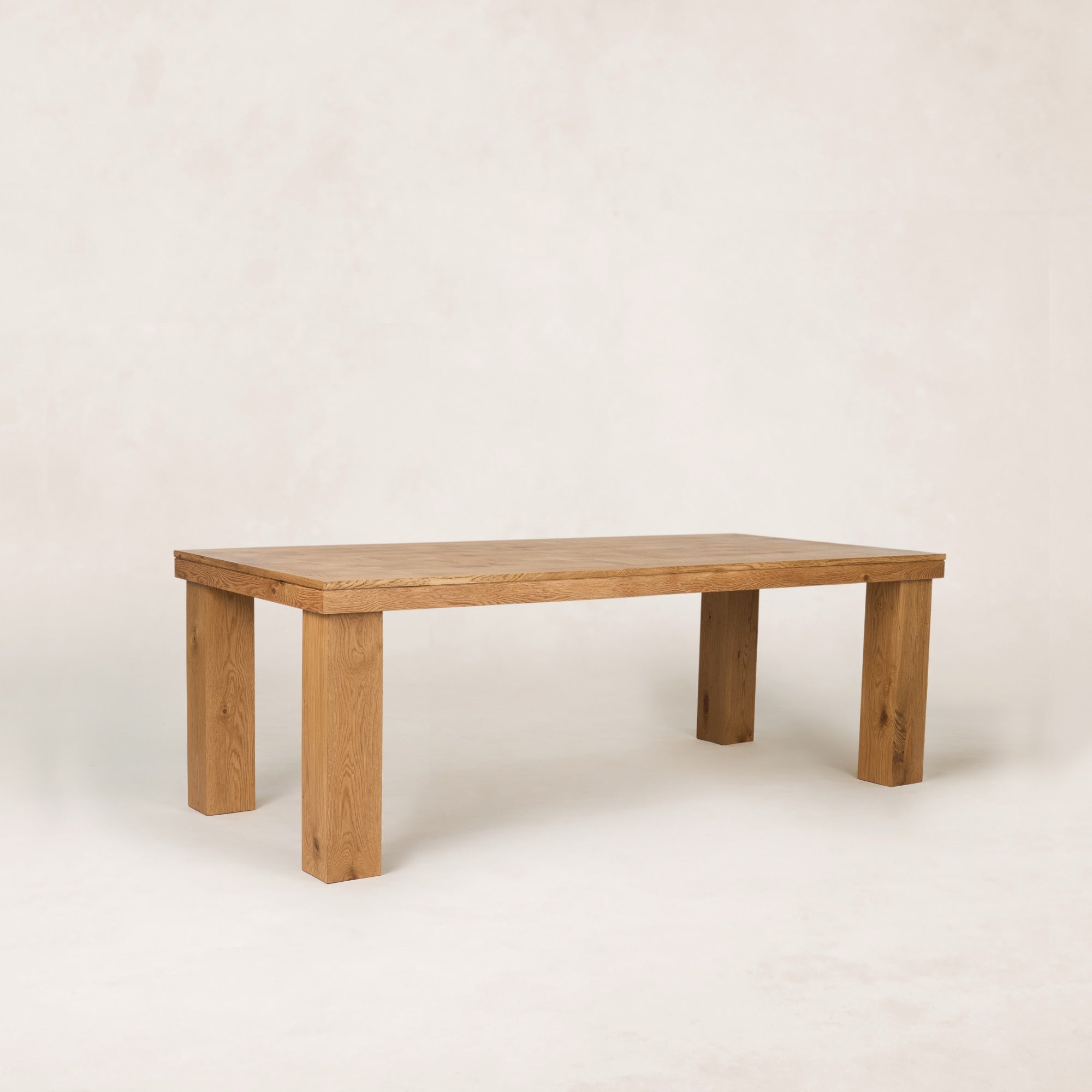 https://cdn.shopify.com/s/files/1/0593/2217/1565/files/Ghent_DiningTable_88_3_4_Parquet_SolidOak_FrenchOak.jpg?v=1772823104