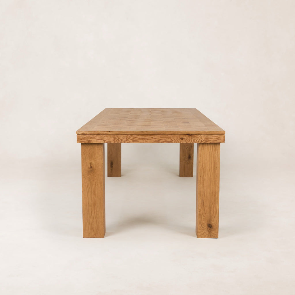https://cdn.shopify.com/s/files/1/0593/2217/1565/files/Ghent_Dining_Table_1oo_Side_Parquet__Detail_Solid_Oak_French_Oak.jpg?v=1772823104
