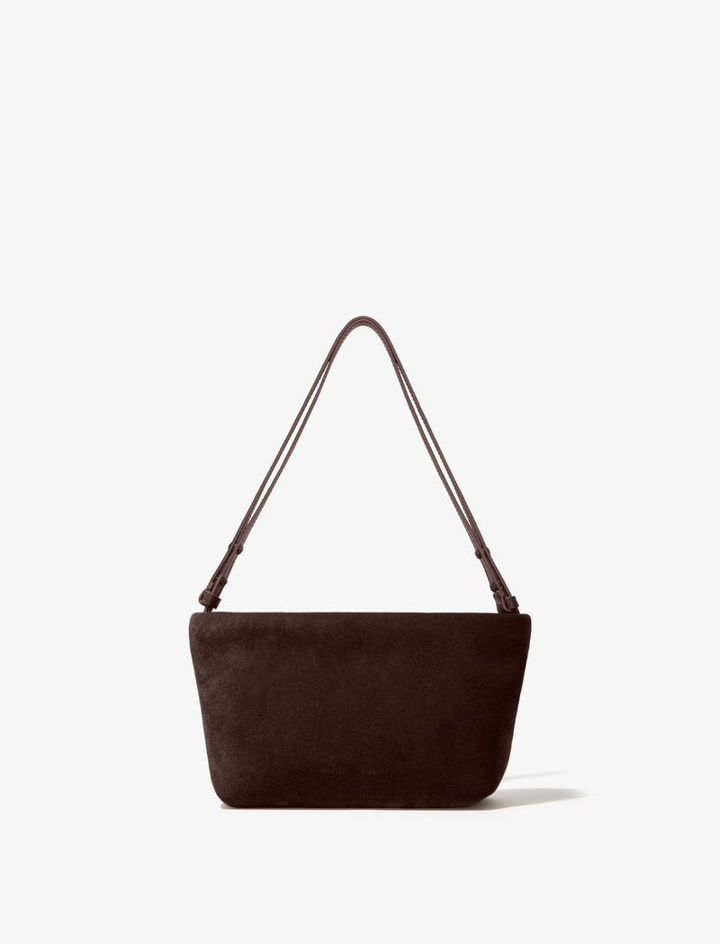 https://cdn.shopify.com/s/files/1/0027/1699/1534/files/HB243071-C012S-206_Bond_20Bag_20in_20Suede_Chocolate_V0.jpg?v=1744912522