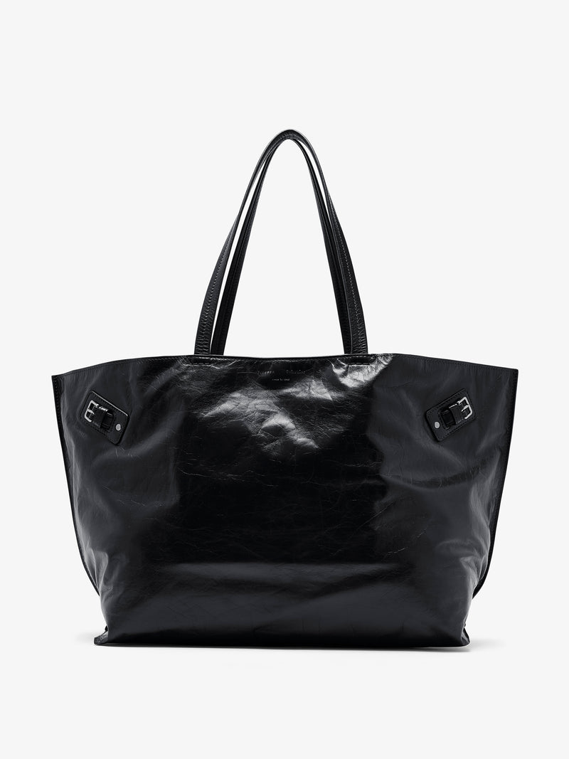 https://cdn.shopify.com/s/files/1/0027/1699/1534/files/HB252087-C530S-001_Days_20Carryall_20in_20Paper_20Calf_Black_V1.jpg?v=1752718887