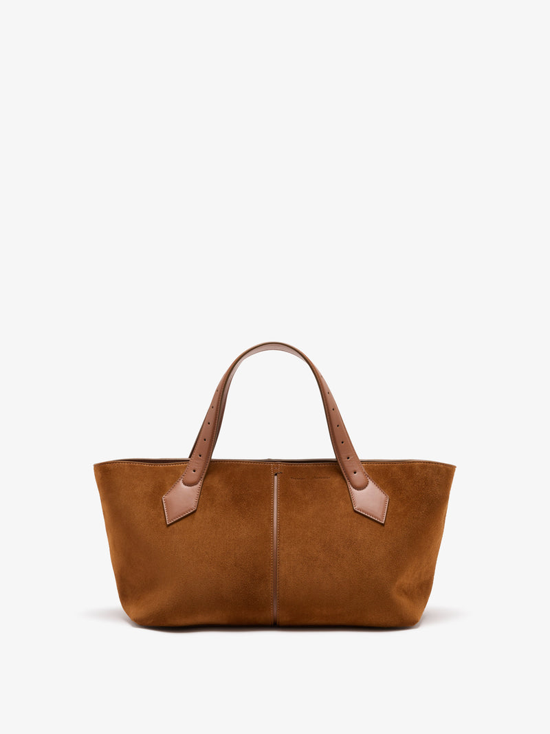 https://cdn.shopify.com/s/files/1/0027/1699/1534/files/HB261121-C012P-215_East_20West_20Chelsea_20Tote_20in_20Soft_20Suede_Saddle_V1.jpg?v=1760923586