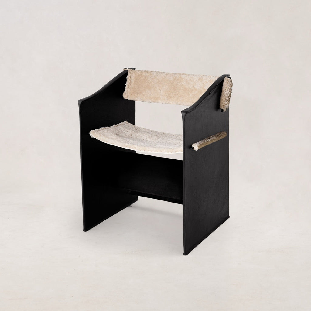https://cdn.shopify.com/s/files/1/0593/2217/1565/files/Ingress-Dining-Chair-Bone-Shearling-1.jpg?v=1764709119