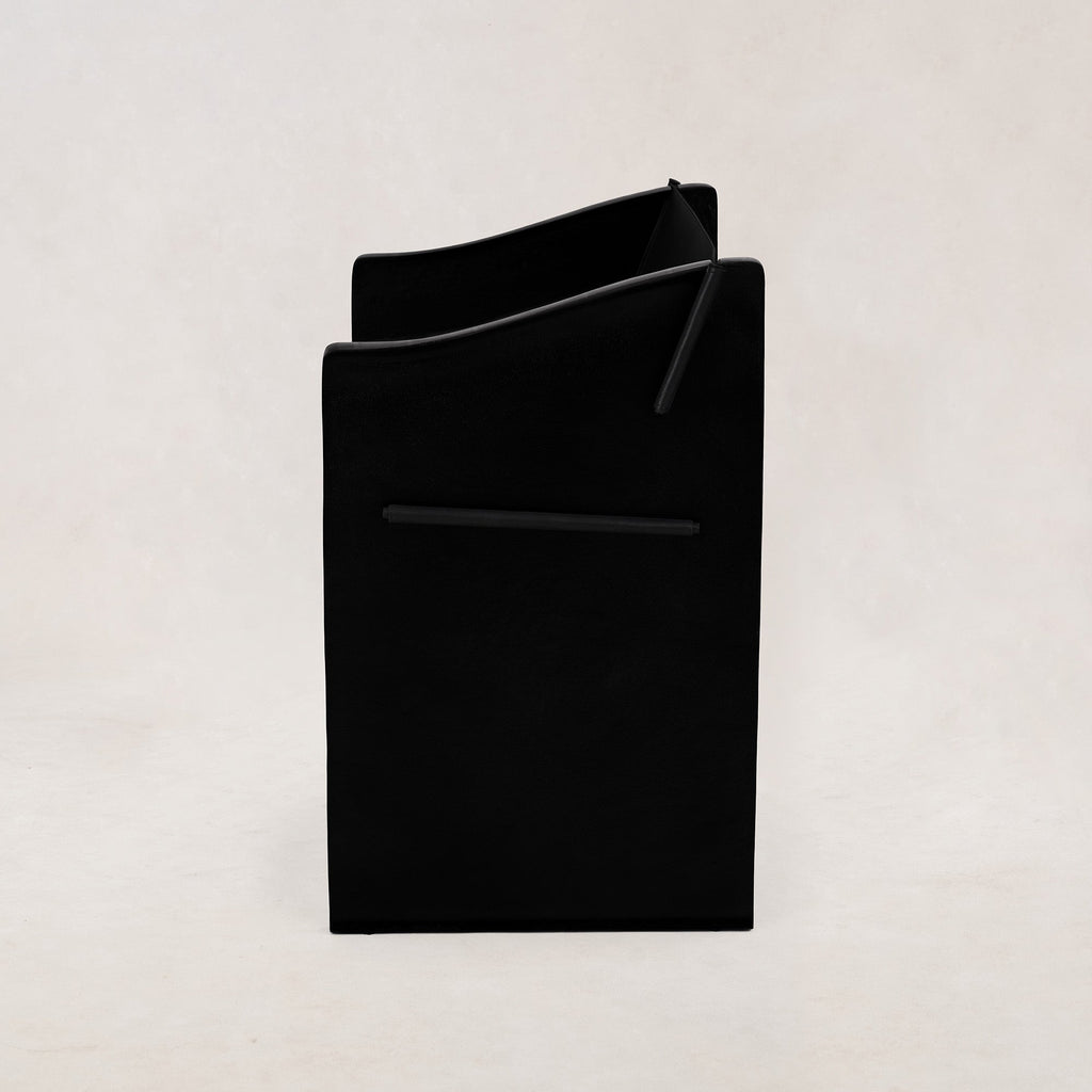 https://cdn.shopify.com/s/files/1/0593/2217/1565/files/Ingress-Dining-Chair-Hair-on-Hide-Black-4.jpg?v=1764709119