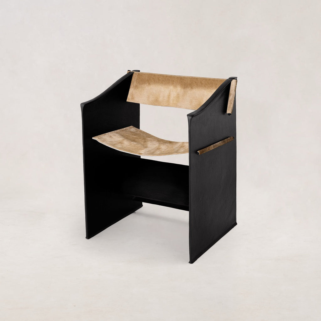 https://cdn.shopify.com/s/files/1/0593/2217/1565/files/Ingress-Dining-Chair-Hair-on-Hide-Camel1.jpg?v=1764709119