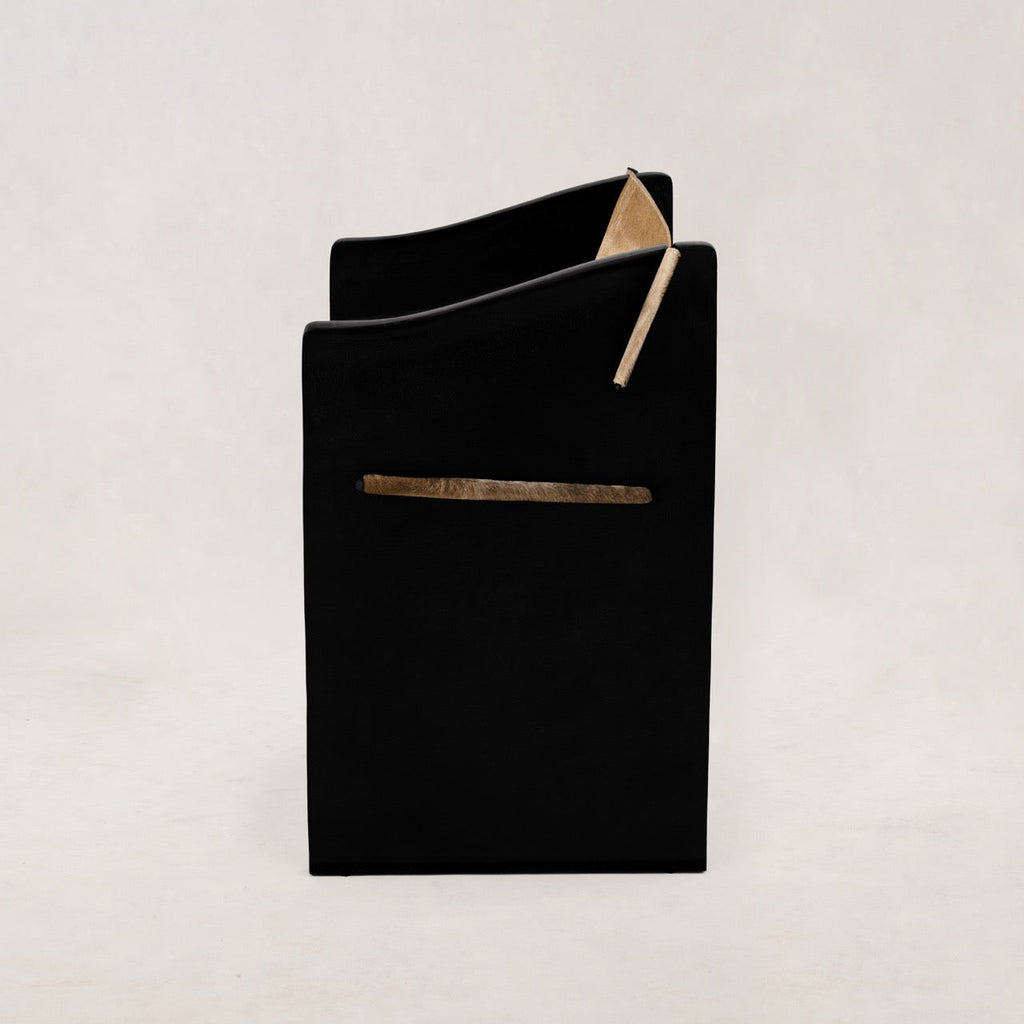 https://cdn.shopify.com/s/files/1/0593/2217/1565/files/Ingress-Dining-Chair-Hair-on-Hide-Camel4.jpg?v=1764709119