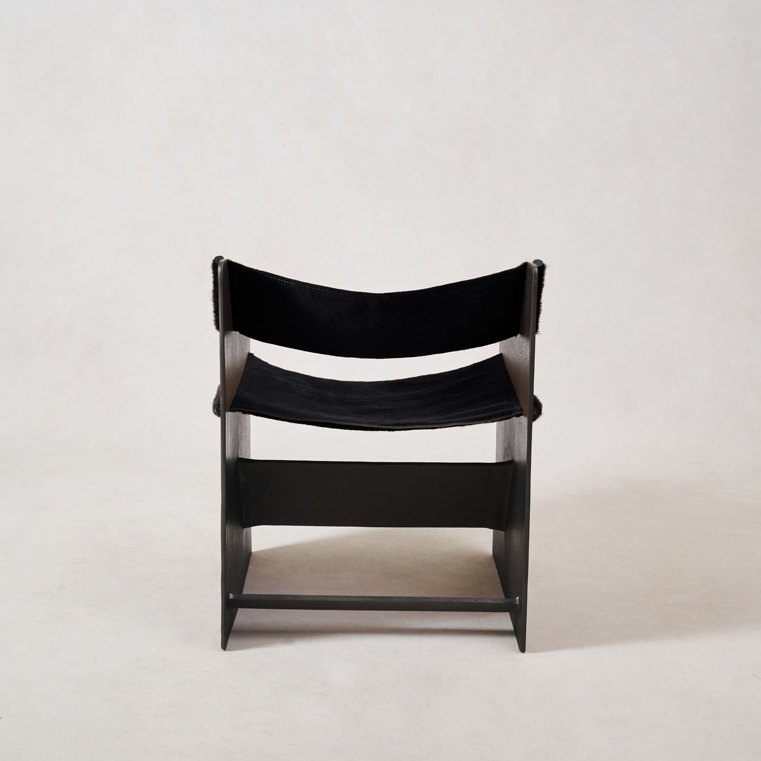 https://cdn.shopify.com/s/files/1/0593/2217/1565/files/Ingresso-Accent-Chair-Black-Hair-On-Hide-3.jpg?v=1753822707