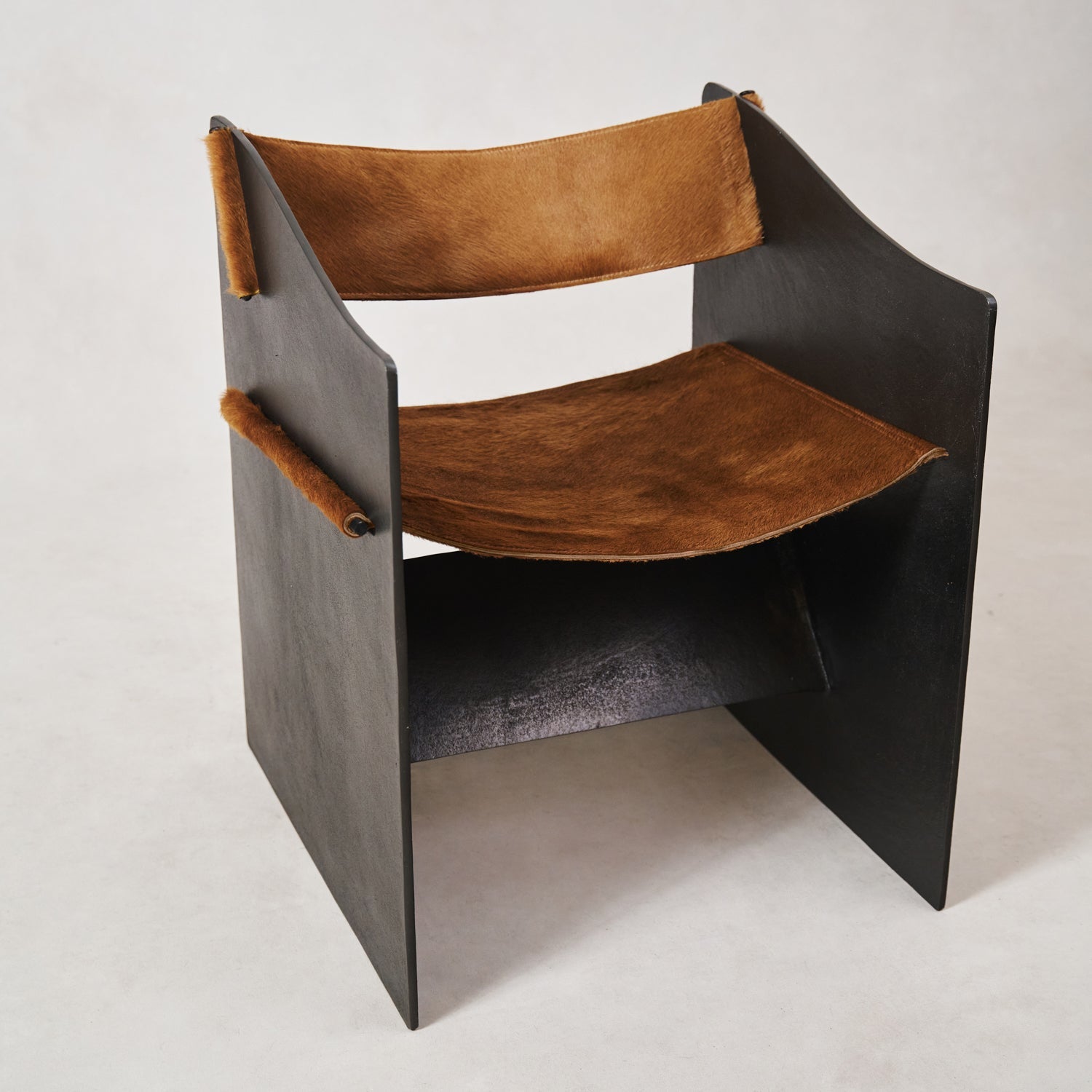 https://cdn.shopify.com/s/files/1/0593/2217/1565/files/Ingresso-Accent-Chair-Whiskey-Hair-on-Hyde-10.jpg?v=1753822707