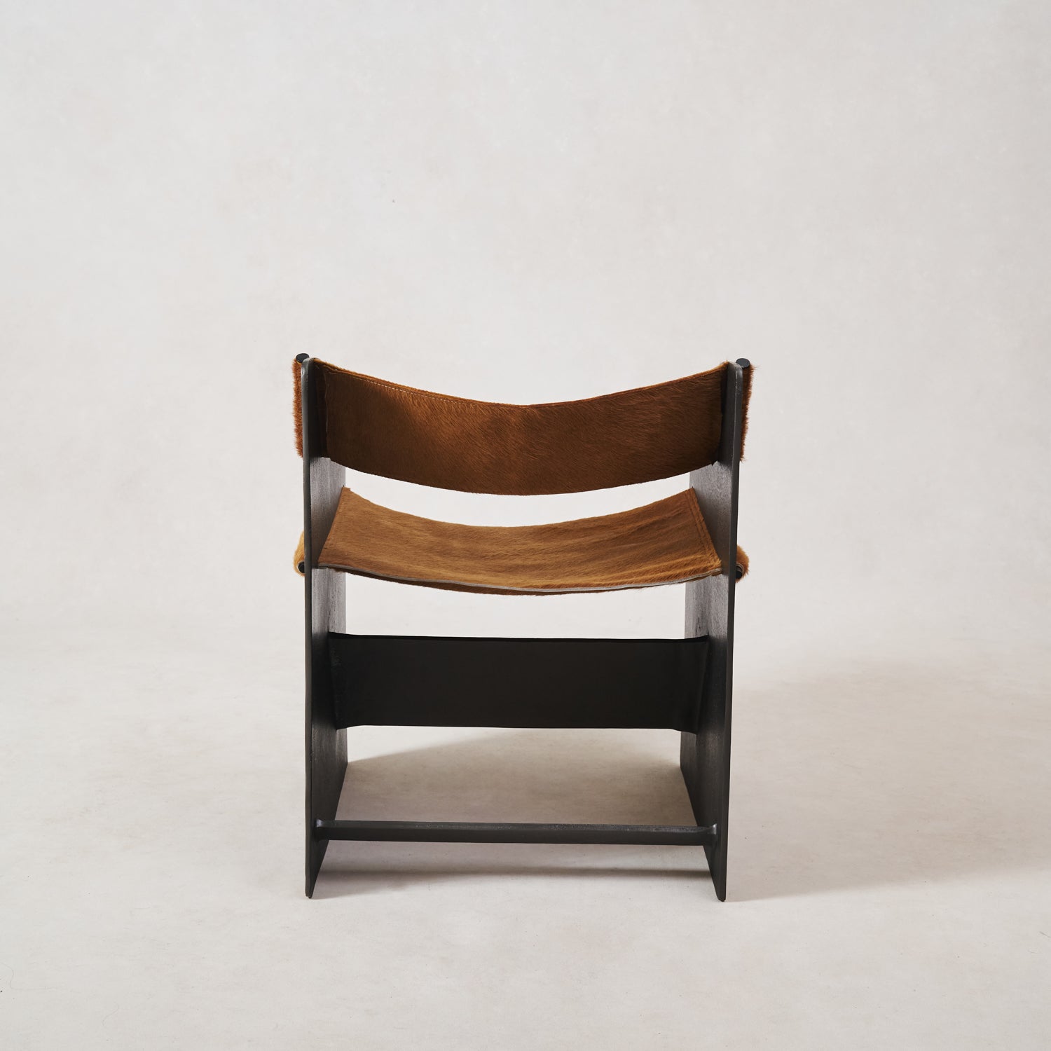 https://cdn.shopify.com/s/files/1/0593/2217/1565/files/Ingresso-Accent-Chair-Whiskey-Hair-on-Hyde-4.jpg?v=1753822707
