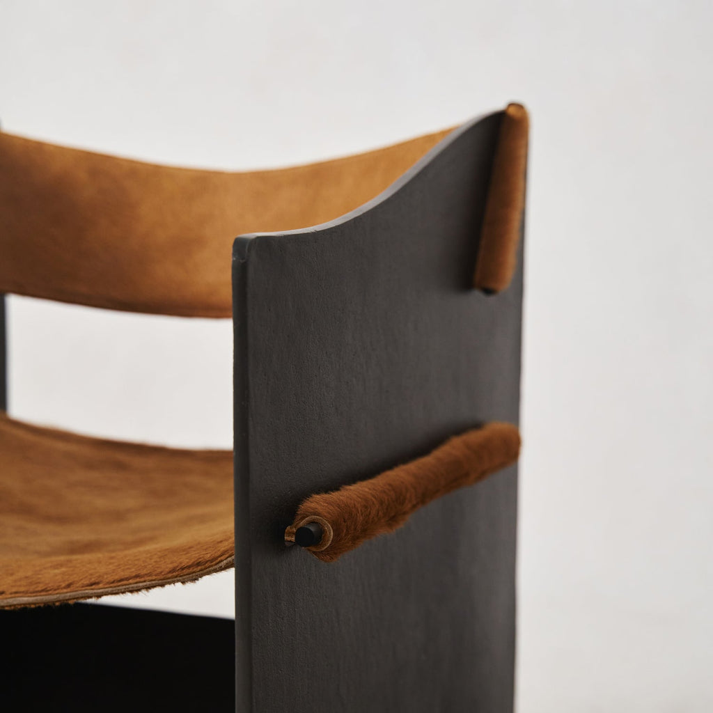 https://cdn.shopify.com/s/files/1/0593/2217/1565/files/Ingresso-Accent-Chair-Whiskey-Hair-on-Hyde-8.jpg?v=1753822707