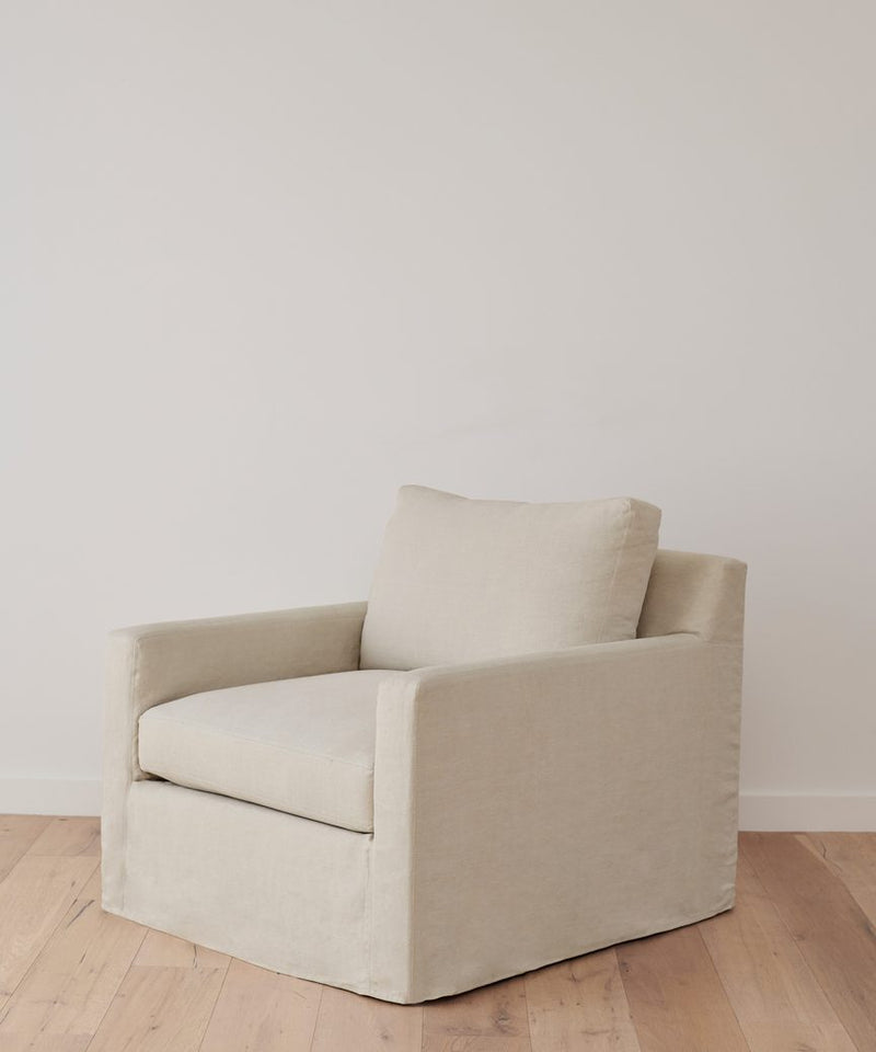 https://cdn.shopify.com/s/files/1/0565/1234/8333/products/JenniKayne_HarborChair_Natural1.jpg?v=1762182572