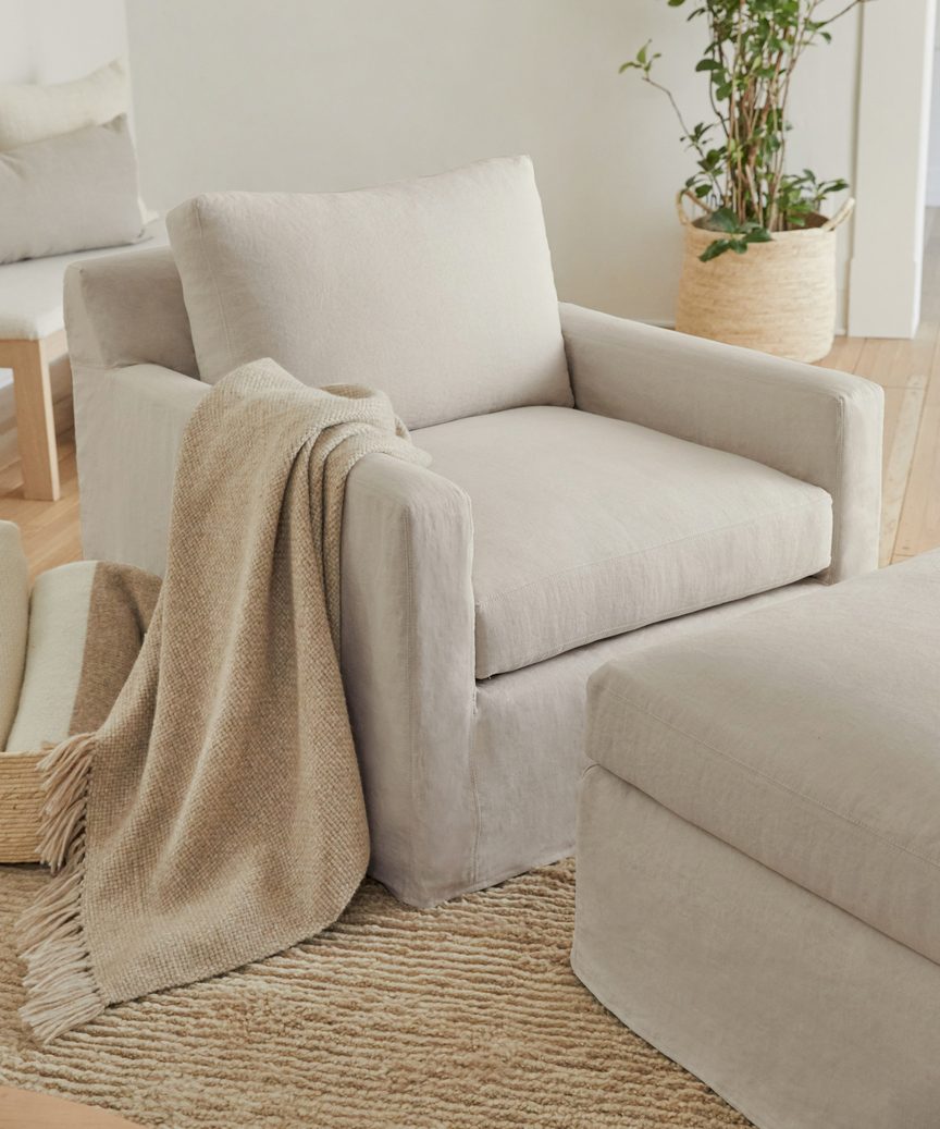 https://cdn.shopify.com/s/files/1/0565/1234/8333/products/JenniKayne_HarborChair_Natural3.jpg?v=1663082506