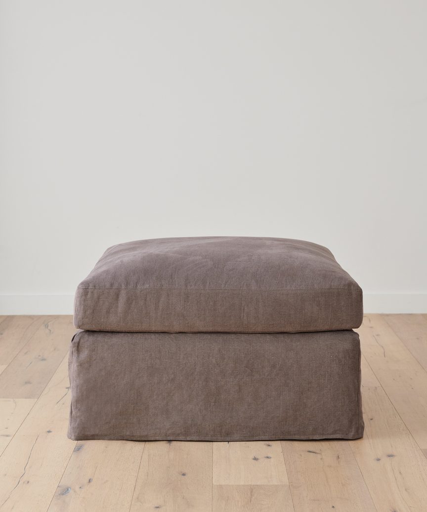 https://cdn.shopify.com/s/files/1/0565/1234/8333/products/JenniKayne_HarborOttoman_CharcoalLinen-1.jpg?v=1632978442