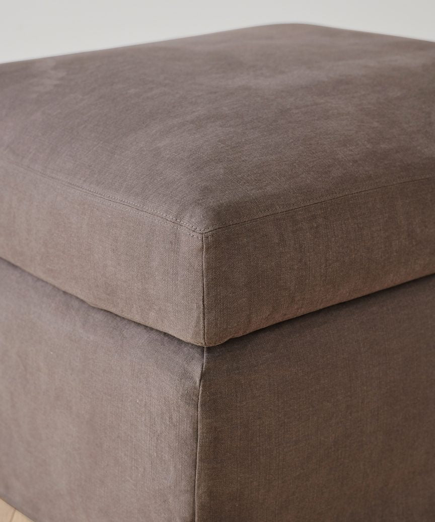 https://cdn.shopify.com/s/files/1/0565/1234/8333/products/JenniKayne_HarborOttoman_CharcoalLinen-2.jpg?v=1632978442