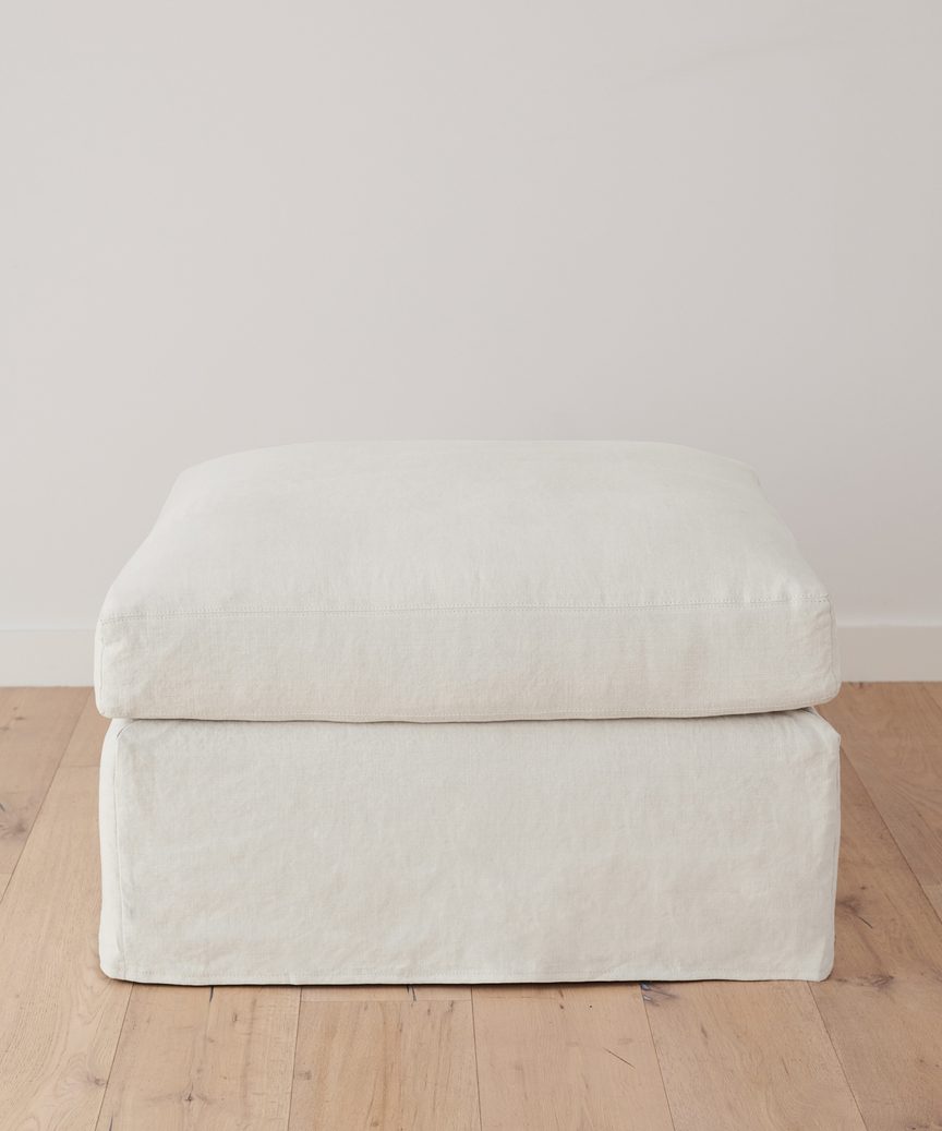 https://cdn.shopify.com/s/files/1/0565/1234/8333/products/JenniKayne_HarborOttoman_IvoryLinen-02.jpg?v=1632978441