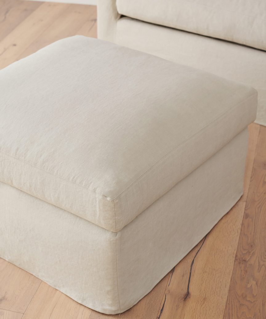 https://cdn.shopify.com/s/files/1/0565/1234/8333/products/JenniKayne_HarborOttoman_Natural2.jpg?v=1632978444
