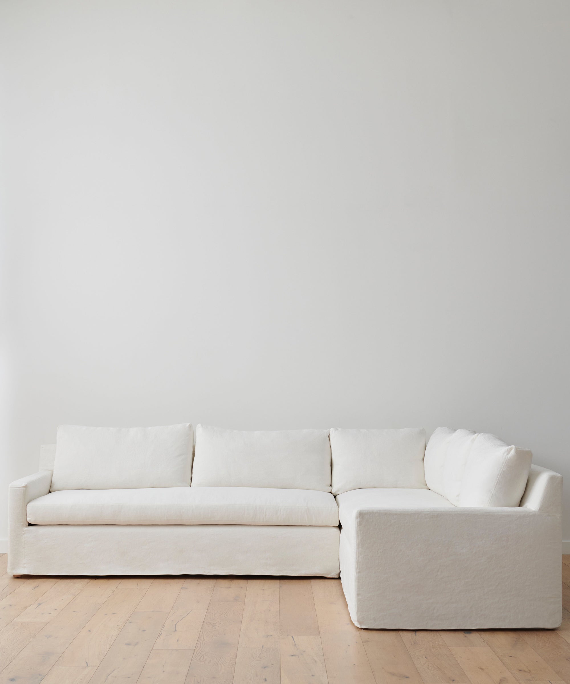 https://cdn.shopify.com/s/files/1/0565/1234/8333/products/JenniKayne_HarborSectional_Ivory-001.jpg?v=1762182569